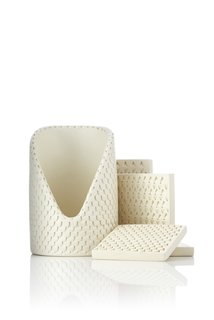 When fired at 2200 degrees Fahrenheit, the tan clay turned a pure, ivory white. No glazing was necessary.