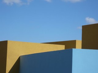 Zucker says that he tried different colors, but eventually went to blue for the floors and the public area perforated with windows. "It’s the color of the sky, which is very clear there, with very few clouds," he says.<br><br>Photo courtesy <br><br>Z-A Studio.