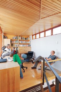 On the top floor, a new addition provides office space for Bernier and Thibault, where a V-shaped ceiling maximizes headroom within local building-height restrictions.