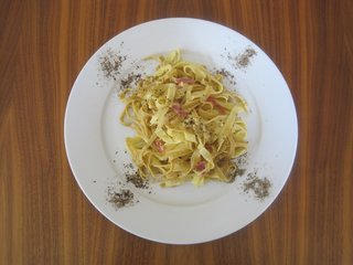 Pasta Carbonara - Photo 2 of 4 - Anne's homemade pasta carbonara, plated with her requisite generous serving of black pepper.