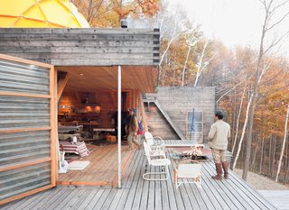 A Platform for Living - Photo 6 of 28 - Translucent fiberglass panel walls form a permeable, fiber-reinforced plastic membrane between indoors and out.