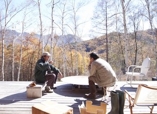 A Platform for Living - Photo 24 of 28 - Weekends at the retreat are relaxed, consisting mostly of chopping firewood or sitting around the fire pit on the deck.
