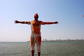 Touring India - Photo 20 of 27 - After a day of celebrating I walked, covered in paint, along the water.