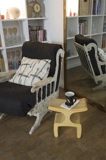 Scholtus created what she calls the "Never-Empty Shelf" of boards made from recycled sawdust from FSC-certified wood. The natural Portuguese cork floor tiles from Wicander were installed without glue.