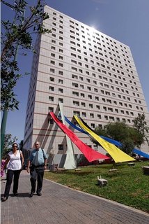 A view of the Dasding Hofmann's 'Lobby' project, with colorful banners stretching down from the Tower building.