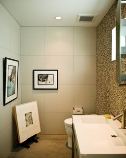 No room in the house is free from Jacobson's keen curatorial eye. The office bathroom is adorned with an original Glen E. Friedman image of skate legend Tony Alva (across from toilet) and a picture of Nathan Fletcher by Mark Oblow (adjacent). Framed on the floor is a George Condo illustration.