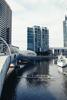 Exploring Melbourne, Australia - Photo 14 of 25 - Docklands, a large new development just west of the Central Business District, is a big space full of big buildings that hopes to attract tenants—–residential and commercial alike—in part through design. The Webb Bridge by Denton Corker Marshall is meant to mimic an aboriginal eel trap and is a fine addition to the neighborhood.