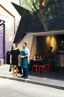 Exploring Melbourne, Australia - Photo 4 of 25 - Melbournians take their food and drink as seriously as their design. Cafes, bars, and restaurants that pay as much attention to what’s on the menu as what surrounds it abound. Liaison Cafe has a friendly, well-executed interior tucked away on tiny Ridgeway Place. It’s on the bottom floor of the geometric Monaco House by architects McBride Charles Ryan.
