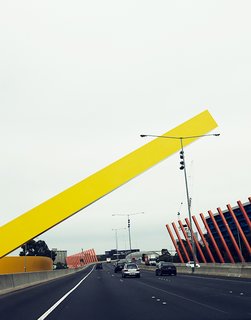 Exploring Melbourne, Australia - Photo 19 of 25 - The Citylink Freeway has all manner of massive sculpture and public art along it. This sculpture, which welcomes drivers to Melbourne, is by the architecture firm Denton Corker Marshall and went up in 1999.