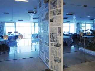 Giant pillars in the lobby are reminiscent of Ponti's faceted design for the Pirrelli tower in Milan.