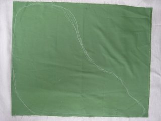Fold the green fabric in half, width-wise, and draw out your Jabba shape in chalk.