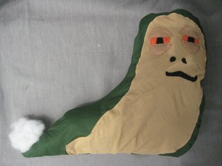 Stuff Jabba through the small, unstitched hole you left.