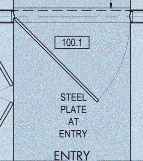 Building the Maxon House: Week 16 - Photo 2 of 10 - The entrance to the residence requires you to pass through a six-foot-wide steel door. The steel of the ramp seamlessly continues into the residence and ends at the vertical steel art wall.