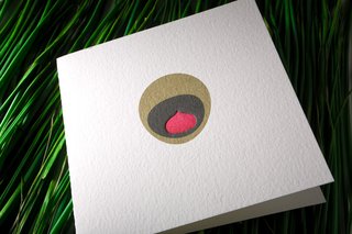 Another take on the Peacock card does away with the outer dotted ring entirely for a pleasingly minimalist effect.