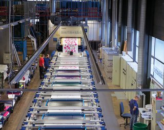 The Marimekko factory prints nearly 6,500 yards of fabric each day. The company typically purchases its material, usually cotton, in 2,200- to 5,500-yard rolls or pallets from Germany, Peru, Turkey, and the Baltic nations. Flat screen–printing makes it possible to divide repeats in sections and create large-size patterns, from 24 inches to several yards long.