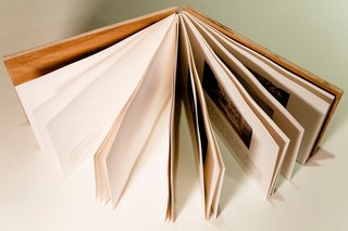 Here you can see the two wood covers and the stitched binding.