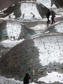 The CD blankets were draped over inflatable mounds.