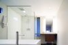 The bathroom in Riley's Cove. Photo by Tim Bies, Olson Kundig Architects. Photo of Building the Maxon House: Week 24 modern home