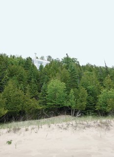 This Lake House Is a Living Piece of Architecture History - Photo 6 of 21 - A view of the residence from the shore of Lake Michigan.