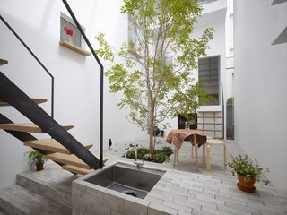 "We tried to achieve a space in which inside and outside co-exist together," architect Akira Mada says. "As we walk around the house, at times we feel the space is totally outside while at other moments it is an interior. It’s this co-existence that gives the residence its unique atmosphere."