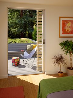 "We call it the design the "2 Bar House" because there's a horizontal and perpendicular bar; one of the bars really looks over the other's roof. It would be unfortunate to only look out over this shiny white roof," says Feldman. "The master suite could be this thing that was kind of unfortunate, or it could be this secret garden and so the green roof became this splurge. A green roof is never something we design when we're out of money because it costs much more than a standard roof."