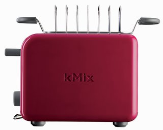 The toaster also features a stainless steel bun warmer and toast rack.