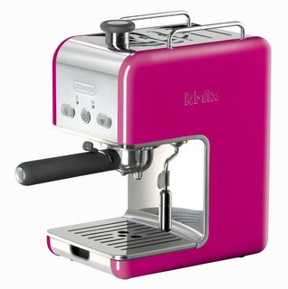 The espresso maker includes a removable water tank and a cup-warming tray.