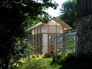 The Dos and Don'ts of Building Your Own Chicken Coop - Photo 3 of 4 - Architect Keith Moskow, a partner at Moskow Linn Architects for more than 20 years, and cofounder Robert Linn decided it was time to help a new generation of designers. Earlier this year, they established Studio North, a design-build branch of their practice, and with five eager students, created and constructed the Chicken Chapel. The entire structure takes on the look of a Japanese lantern in the evening. The team added lights so you could go in and be able to see where you are at night and also so that come late fall and winter, Moskow can turn them on after the sun sets to maintain the chicken's waking, eating, and egg-laying hours even as the days shorten.