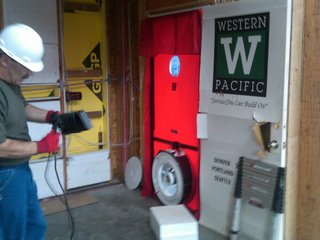 Performance-testing the home with a blower door and sealing it well is perhaps the lowest hanging fruit in the world of building energy efficiency. The blower door depressurizes the house and helps to find leak points. We sealed our homes to nearly twice what is required by code.