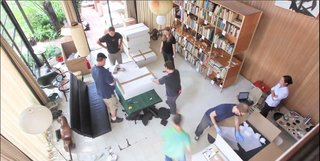 A still from the time lapse video of the Eames living room being packed up and moved.