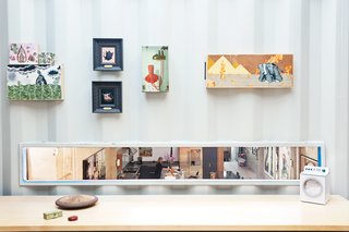 Wardell's office boasts a rectangular cutout the couple calls the "dinner's ready slot" for its bird's-eye perspective on the kitchen.
