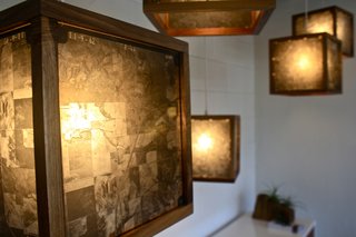 Denver's Fin Art Co. - Photo 1 of 5 - "These hanging lights are framed in walnut and made from original 1960's glass negatives of the Texas landscape taken from a survey plane," says Rob McGowan.