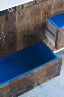 Denver's Fin Art Co. - Photo 4 of 5 - The wood used for the front of this dresser was taken from a 1950s factory cart. I really like the pop of cerulean in the drawers.