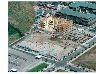 The site we negotiated with Port Blakely Communities. zHome is the community to the left of the photo with the concrete pumper and the larger podium and framed community is the YWCA Family Village.