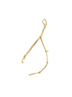 After the branch is cast in bronze, it's plated in either gold, silver, or brass.