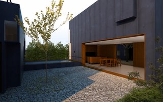 Dwell Home Venice: Part 2 - Photo 3 of 7 - A computer rendering showing the dining room and living room looking onto a central courtyard. A raised swimming pool deck acts as a connecting form between two separate parts of the house. The master bedroom is shown on the left. The house features a steel exterior skin.