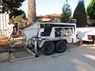 The pump that will push the concrete down a hose from the street to the furthest part of the site some 129 feet away.