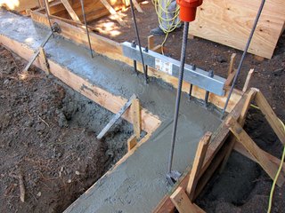 The footing surface after cleaning with a trowel.