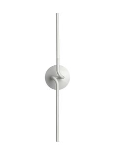 Light Spring forms part of a series of wall lamps by Flos which feature a very simple and linear design and a die-cast, painted tubular aluminum body.