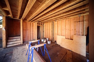 Here's the site of the future kitchen. The area to the right of the stairs will house a stack of Miele appliances and the wall on the right is the location of a long Caesarstone counter with cabinets above and below.