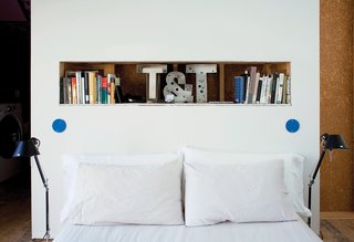 Organizing objects in small groups is a great way to signify a transition between certain subjects on a shelf, as pictured above.