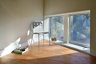 Laminated tongue-and-groove decking by Lock-Deck was used for the second-level floor. The durable material is sturdy enough to span long distances without joists, maximizing headroom in the first-floor living room.