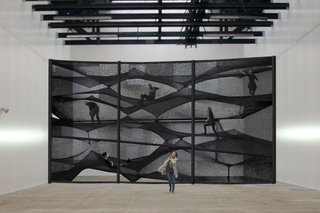 Floating Landscape Made of Net - Photo 1 of 3 - A view of the installation at the House for Contemporary Art in Belgium.