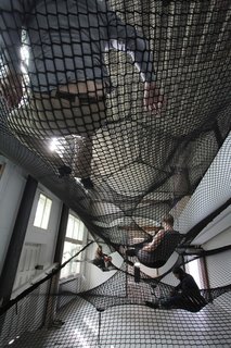 Floating Landscape Made of Net - Photo 3 of 3 - Numen's Net, occupied by gallery attendees.