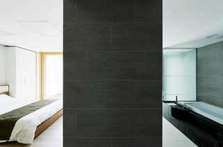 Serenity nowDesigned to suit all the needs of a Korean family of four, the interior takes what Unsangdong calls "emotional design" as seriously as energy efficiency. This tranquil ground-floor bedroom and bath were created with the help of Japanese interior designer Kondo Noriko.