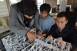 The physical model, like the final installation, is broken down into smaller sections with each section consists of four vertical units.