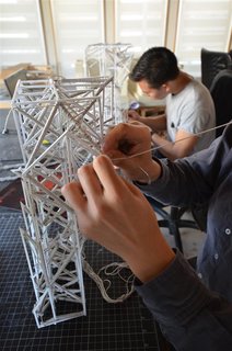 After it is pre-looped, a continuous piece of yarn runs from top to the bottom frame.