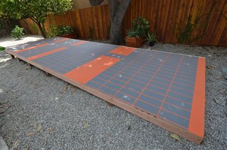 The tape is removed to reveal the orange grid.
