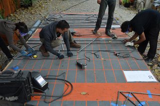 We lay out steel tubes on the platform based on the fabrication drawings, and then mark the angle of the cut on the steel tubes.