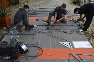 After measuring, our staff cut the ends of the steel tubes to the correct angle.